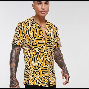 ASOS DESIGN regular reverse shirt in mustard.